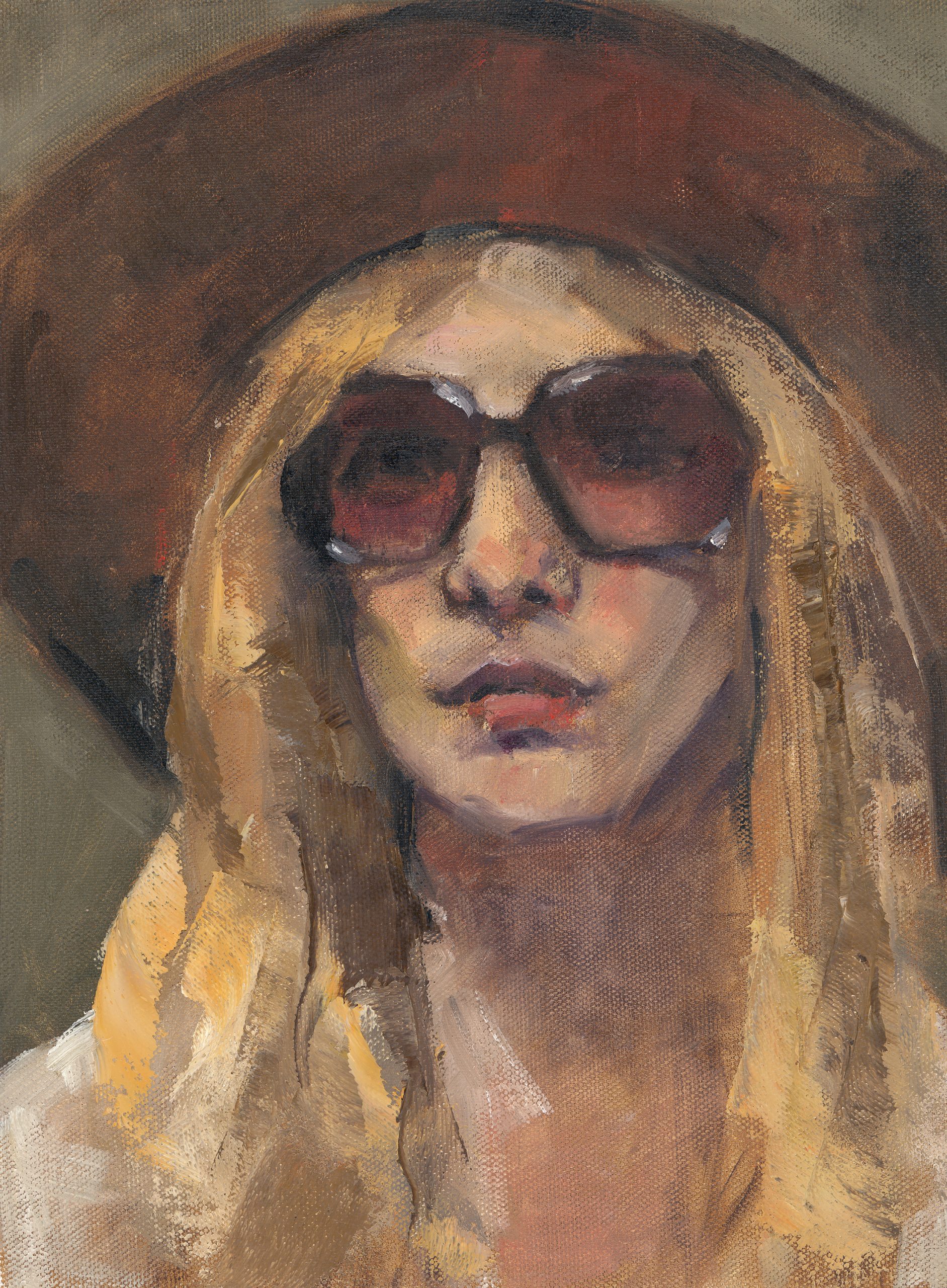 woman with blonde hair, a big hat, and sunglasses